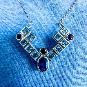 Elegant Silver and Blue Topaz Geometric Necklace